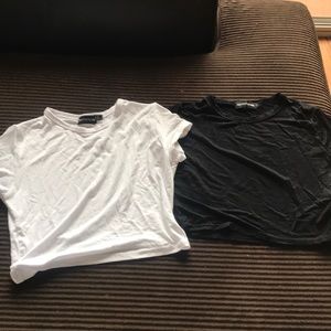 Two cropped t shirts